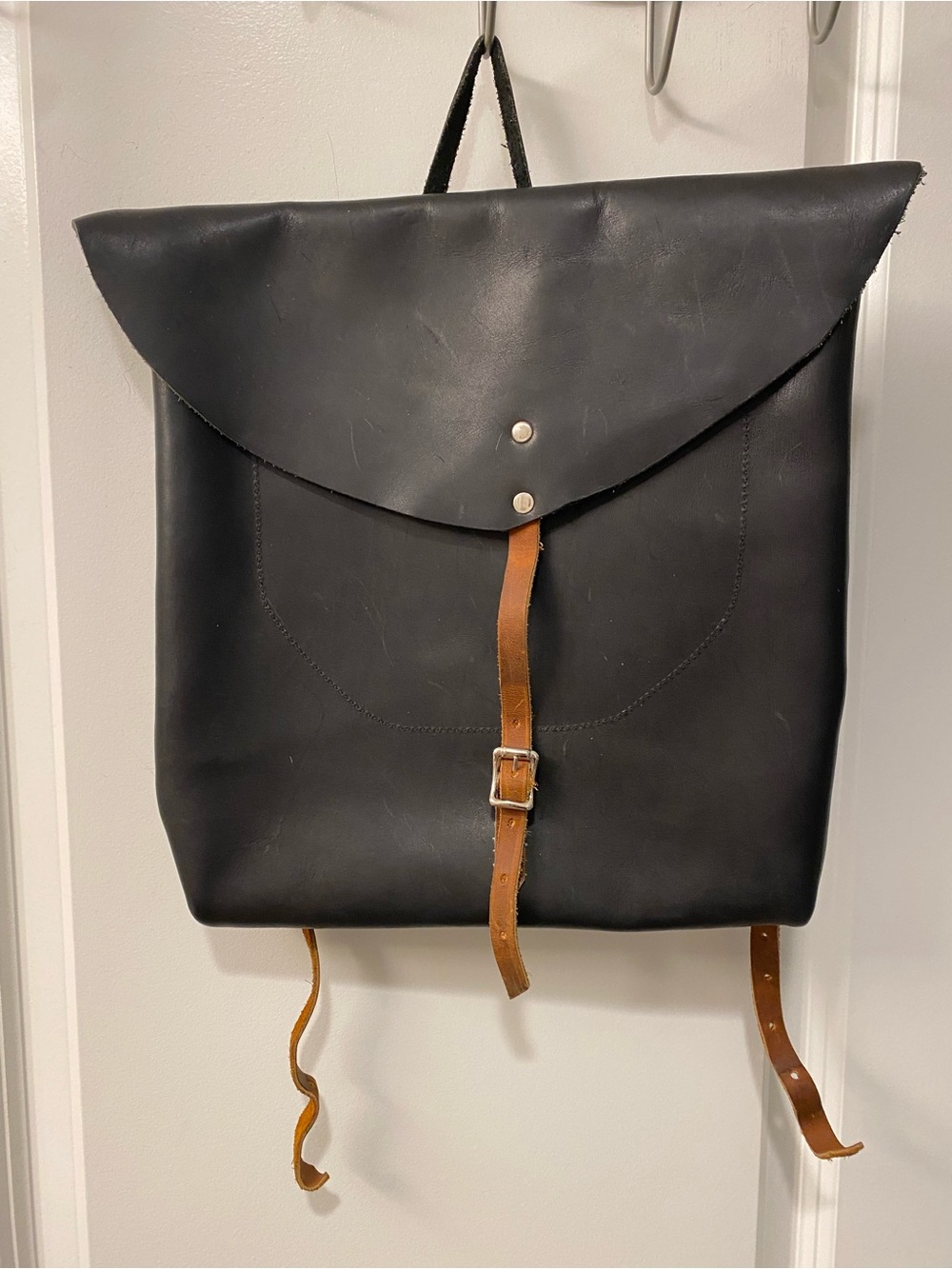 Offset Minimalist Black Leather Backpack with Brown Strap